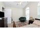 Bright bedroom with a large window, comfortable chair, and neutral decor at 2111 Savoy Pl, Fort Mill, SC 29707