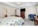Comfortable bedroom with a ceiling fan, television, desk, and ensuite bathroom access at 2111 Savoy Pl, Fort Mill, SC 29707