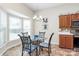 Eat-in kitchen featuring a breakfast nook with bay window for natural light and stainless steel appliances at 2111 Savoy Pl, Fort Mill, SC 29707