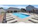 Community pool with plenty of lounge chairs for residents at 2111 Savoy Pl, Fort Mill, SC 29707