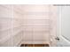 Walk-in closet with installed shelving for optimal storage and organization at 215 Giant Oak Ave, Statesville, NC 28677