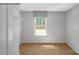 Spacious walk-in closet featuring installed shelving for optimal storage at 215 Giant Oak Ave, Statesville, NC 28677
