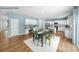 Open dining area with white cabinets, a dining table, and easy access to the kitchen at 215 Giant Oak Ave, Statesville, NC 28677
