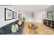 Open living space featuring a sofa, stylish decor, and neutral paint at 215 Giant Oak Ave, Statesville, NC 28677