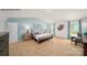 Spacious primary bedroom featuring a neutral palette, plush carpet, and ample light at 215 Giant Oak Ave, Statesville, NC 28677