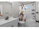 ' bathroom featuring a playful shower curtain, modern fixtures, and a clean design for a bright and cheerful space at 2336 Beth Haven Church Rd, Denver, NC 28037