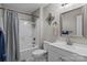 Clean bathroom featuring a shower/tub combo, white vanity, and stylish decor at 2336 Beth Haven Church Rd, Denver, NC 28037