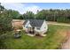 Charming white two-story home with a walkout basement, backyard lawn, and a cozy outdoor patio at 2336 Beth Haven Church Rd, Denver, NC 28037