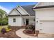 Charming home with a brick foundation, a front door and a well-manicured lawn and landscaping at 2336 Beth Haven Church Rd, Denver, NC 28037