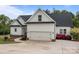Well-maintained two-story home with a black roof, white siding, a two-car garage, and a concrete driveway at 2336 Beth Haven Church Rd, Denver, NC 28037