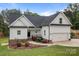Charming home with a brick foundation, a front door and a well-manicured lawn with landscaping at 2336 Beth Haven Church Rd, Denver, NC 28037