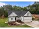Beautiful home featuring a two-car garage, manicured landscaping, and a welcoming front entrance at 2336 Beth Haven Church Rd, Denver, NC 28037