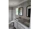 Bathroom with dual vanity with granite counters and tiled shower at 2514 Oak Valley Ln # 4 & 5, Maiden, NC 28650