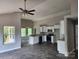 Open-concept kitchen with white cabinetry, granite countertops, and stainless steel appliances at 2514 Oak Valley Ln # 4 & 5, Maiden, NC 28650