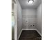 Laundry room with a single shelf, hookups, and dark wood floors at 2514 Oak Valley Ln # 4 & 5, Maiden, NC 28650