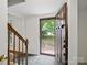 Spacious foyer with slate floors and a staircase, leading to the upper level at 2731 Creekbed Ln, Charlotte, NC 28210