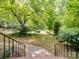 View of the front yard from the front steps at 2731 Creekbed Ln, Charlotte, NC 28210