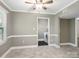 Bright living room leading to dedicated laundry room at 2731 Creekbed Ln, Charlotte, NC 28210