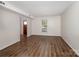 Bright and airy living room with hardwood flooring and plenty of natural light at 2731 Creekbed Ln, Charlotte, NC 28210