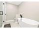 Modern bathroom featuring a standalone tub with sleek black hardware at 2780 China Grove Rd, Kannapolis, NC 28083