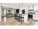 Bright kitchen with an island and seating opens to living area, ideal for modern living, with stylish design at 2780 China Grove Rd, Kannapolis, NC 28083