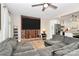 Inviting living room with comfortable seating, brick fireplace, and access to the kitchen at 2780 China Grove Rd, Kannapolis, NC 28083