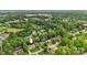 Neighborhood aerial view showcasing the home's location in a well-treed community near schools at 3022 8Th Street Ne Ct, Hickory, NC 28601