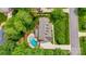 Stunning overhead view of a home with a pool, manicured lawns, and beautiful landscaping at 3022 8Th Street Ne Ct, Hickory, NC 28601