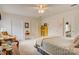 Bright bedroom featuring neutral walls, two closets, and an open doorway to the Primary bath at 3022 8Th Street Ne Ct, Hickory, NC 28601