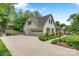 Spacious detached garage with ample parking and storage, complemented by a well-maintained driveway and landscaping at 3022 8Th Street Ne Ct, Hickory, NC 28601