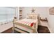 Charming bedroom with a cozy window seat and decorative pillows at 3203 Blackburn Dr, Waxhaw, NC 28173