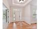 Inviting foyer showcasing hardwood floors, elegant trim, and a bright, welcoming atmosphere at 3203 Blackburn Dr, Waxhaw, NC 28173