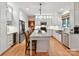 Spacious kitchen with white cabinets, stainless steel appliances, and granite countertops at 3203 Blackburn Dr, Waxhaw, NC 28173