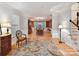 Spacious living room showing hardwood flooring and an open floor plan to the dining room at 3203 Blackburn Dr, Waxhaw, NC 28173