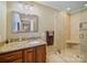 Bathroom features a glass shower, granite countertop, and vanity with wood cabinets at 3313 Lancaster Hwy, Monroe, NC 28112