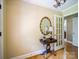 Foyer with hardwood floors, elegant table, and decorative mirror at 3313 Lancaster Hwy, Monroe, NC 28112