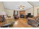 Comfortable living room featuring hardwood floors, fireplace, and natural light, offering a cozy ambiance at 3317 Treyburn Dr, Midland, NC 28107