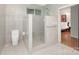 Bathroom featuring modern fixtures, a walk-in shower with marble tile, and access to bedroom at 3385 Rainbow Dr # 7A, Marvin, NC 28173