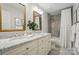 Bathroom featuring dual sinks, granite countertop, tile flooring and a shower with curtain at 3804 Bellingham Ln, Charlotte, NC 28215