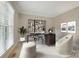 Bright home office space with built-in shelving, desk, and neutral décor at 3804 Bellingham Ln, Charlotte, NC 28215