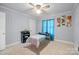 Calm bedroom with a massage table and soft carpet for a relaxing atmosphere at 401 Clover Ln, Newton, NC 28658