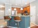 A spacious kitchen with a breakfast bar featuring pendant lighting at 413 River Park Rd, Belmont, NC 28012