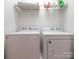A simple, yet functional laundry room at 413 River Park Rd, Belmont, NC 28012
