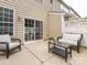 Relaxing outdoor patio with seating, perfect for entertaining or enjoying a quiet moment outside at 413 River Park Rd, Belmont, NC 28012