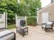 Private patio area with comfortable seating, perfect for outdoor relaxation and entertaining guests at 413 River Park Rd, Belmont, NC 28012