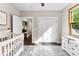 Bright Bedroom featuring a crib, dresser, and windows at 4453 Buffalo Shoals Rd, Maiden, NC 28650