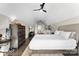 Large bedroom featuring white ceilings, a ceiling fan, seating and a bed at 4453 Buffalo Shoals Rd, Maiden, NC 28650