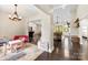Open-concept layout featuring hardwood floors, neutral walls, and transitional decor, blending play and gathering spaces at 4453 Buffalo Shoals Rd, Maiden, NC 28650