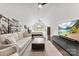 Large living room featuring white ceilings, a ceiling fan, sofa and a TV at 4453 Buffalo Shoals Rd, Maiden, NC 28650