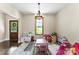 Bright playroom with large window, toys, and unique chandelier providing ample natural light and a cozy atmosphere at 4453 Buffalo Shoals Rd, Maiden, NC 28650